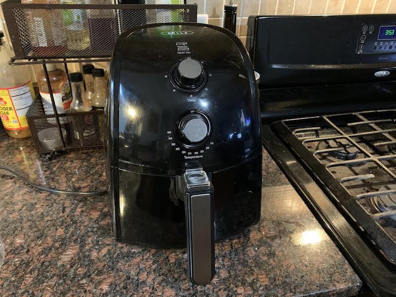 black air fryer on kitchen counter