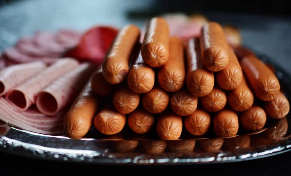 tray of deli meat and hot dogs