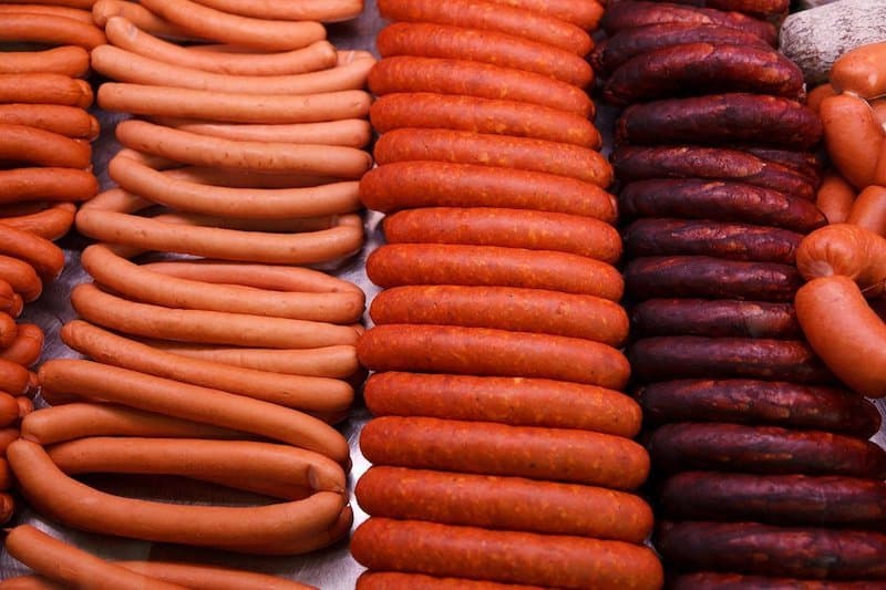 three rows of different types of sausages