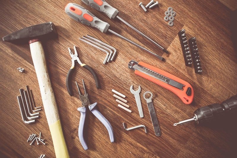 various tools laid out on floor