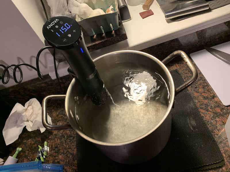 anova nano on pot with water running cleaning cycle