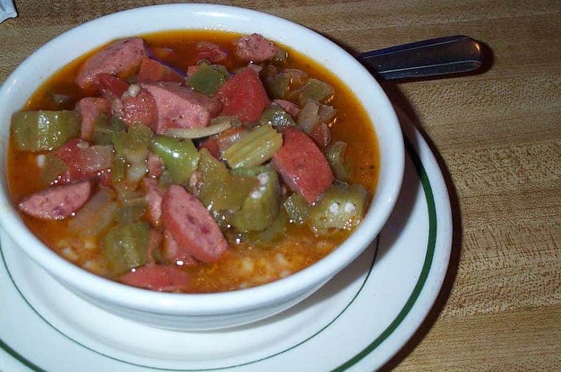 bowl of gumbo with sausage and okra