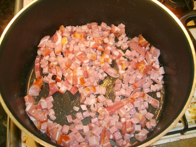 chopped up pancetta stir fried in pot