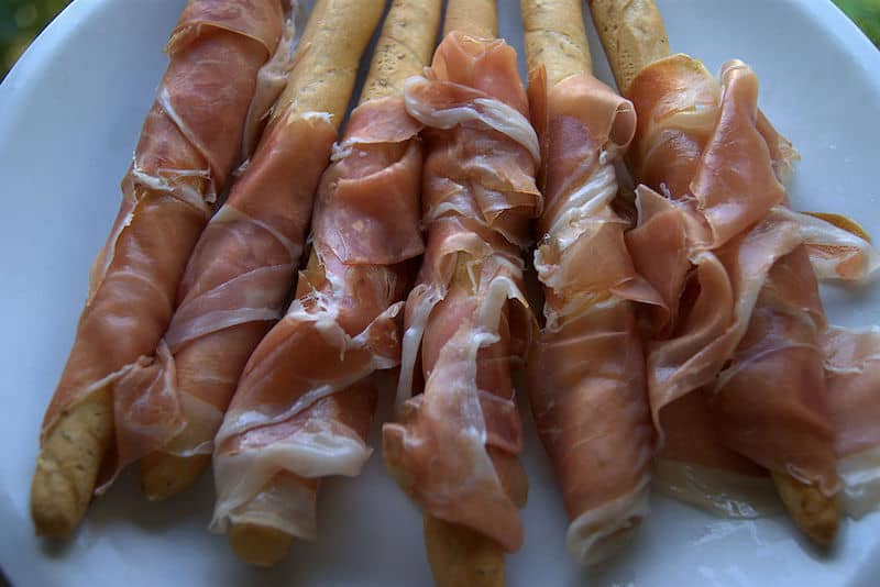 grissini breadsticks wrapped in prosciutto