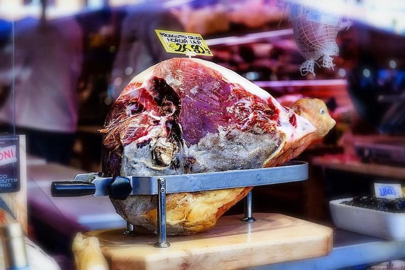 leg of prosciutto in display window