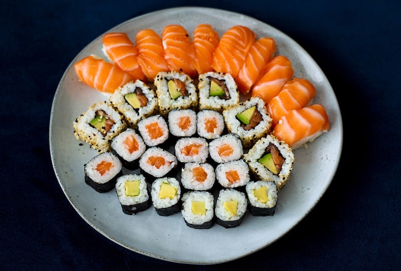 round plate with nigiri and maki sushi