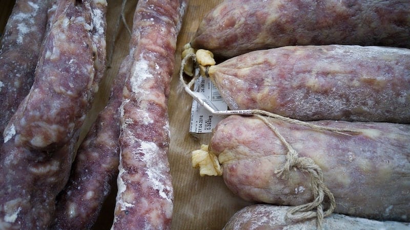 sausages with white mold on outside